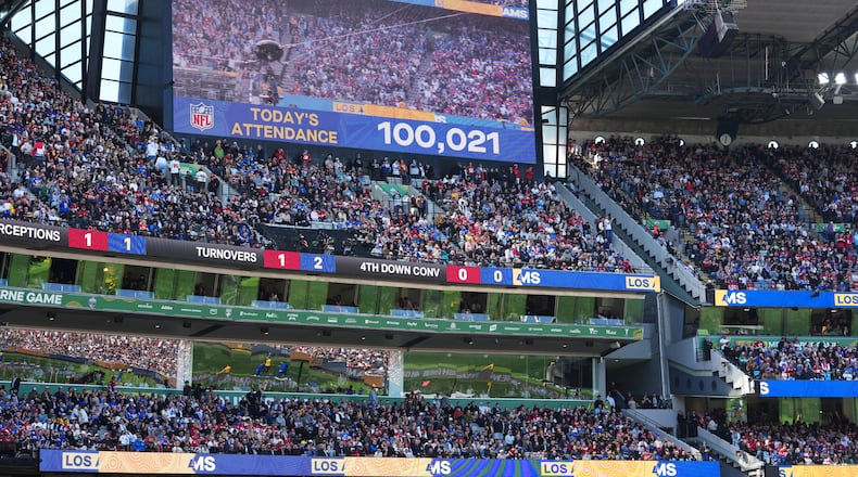 Fans watch during the second half of an NFL football game between the Los Angeles Rams and the San Francisco 49ers, Friday, Sept. 11, 2026, in Melbourne, Australia. (AP Photo/Scott Barbour)