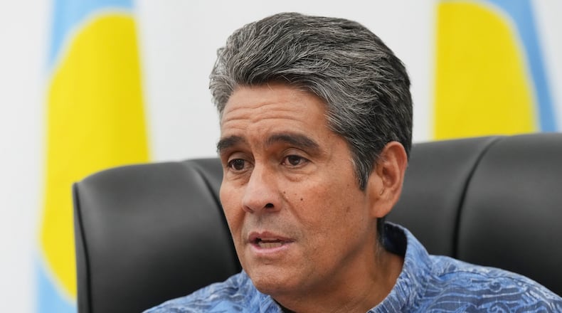 Palau's President Surangel Whipps Jr. speaks to reporters at the Pacific Islands Forum Leaders Meeting in Koror, Palau, Sunday, Aug. 30, 2026. (AP Photo/Charlotte Graham-McLay)