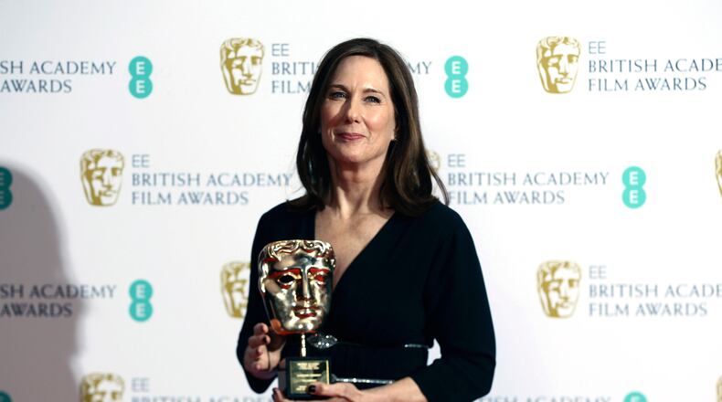 FILE - Kathleen Kennedy, winner of the BAFTA Fellowship, poses with her award backstage at the BAFTA Film Awards in central London, Feb. 2, 2020. (Photo by Joel C Ryan/Invision/AP, File)