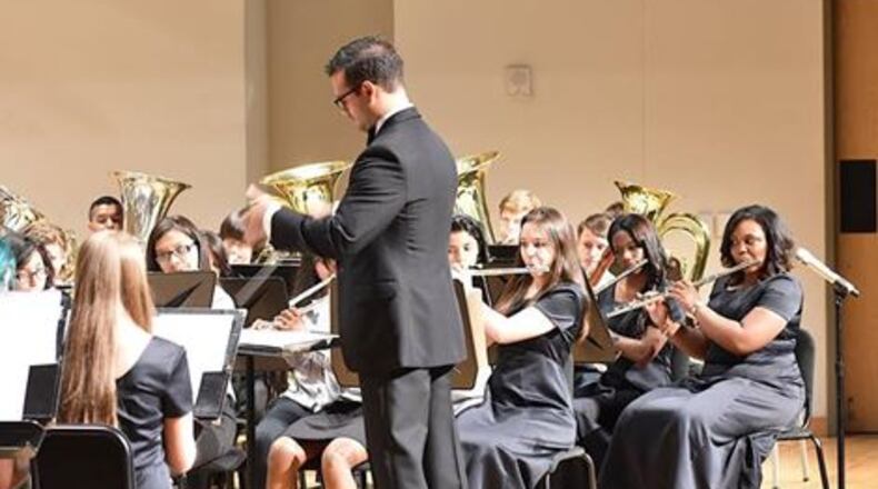 Carlos Rodriguez leads the Riverwood International Charter School Band in a recent concert at Kennesaw State University.
