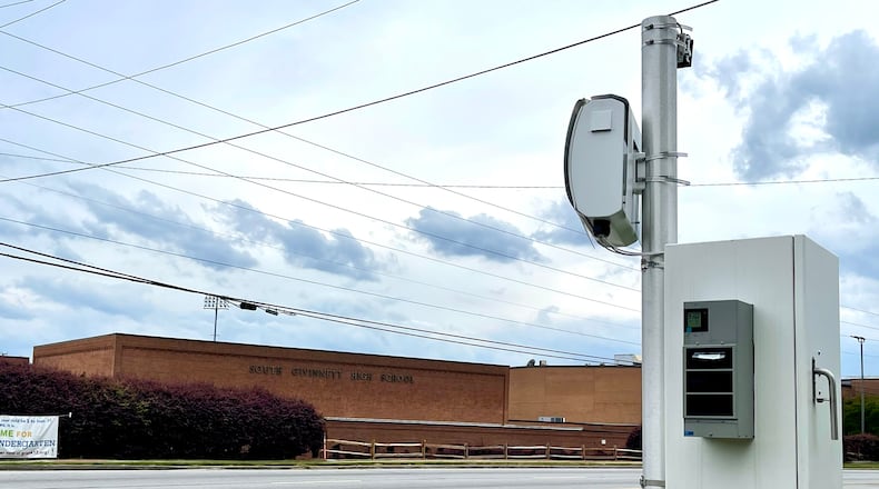 A speed camera on U.S. Highway 78 near South Gwinnett High School. Gwinnett County recently approved a contract to add these cameras to school zones in unincorporated areas. (Tyler Wilkins / tyler.wilkins@ajc.com)