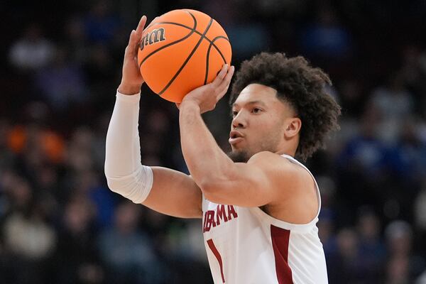 Alabama guard Mark Sears (1) puts up a shot against Brigham Young during the first half of a Sweet 16 round NCAA college basketball tournament game, Thursday, March 27, 2025, in Newark, N.J. (AP Photo/Frank Franklin II)