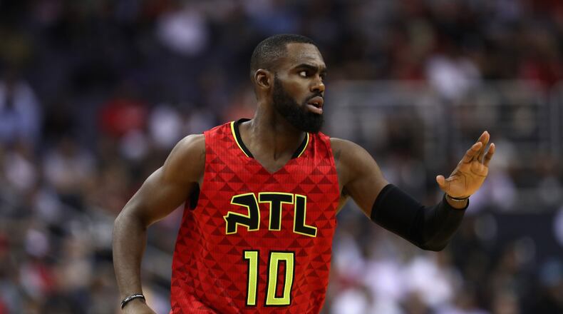 Tim Hardaway Jr. #10 of the Atlanta Hawks celebrates after scoring against the Washington Wizards in the first half of Game Five of the Eastern Conference Quarterfinals during the 2017 NBA Playoffs at at Verizon Center. Photo by Rob Carr/Getty Images