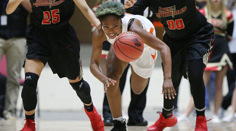 Johnson-Savannah guard Alana Boone chases down a loose ball in the first of back-to-back Class AAA state titles.