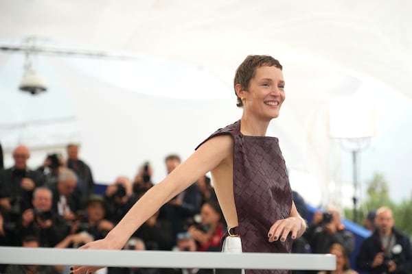 FILE - Vicky Krieps poses for photographers at the photo call for the film 'Love Me Tender' at the 78th international film festival, Cannes, southern France, Tuesday, May 20, 2025. (AP Photo/Natacha Pisarenko, File)