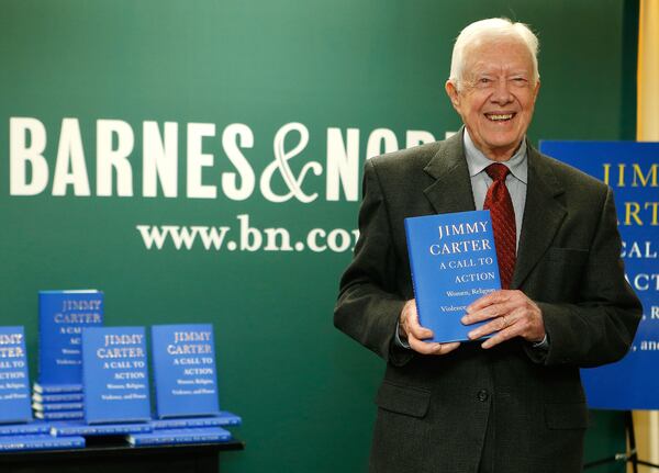 Former US President Jimmy Carter promoting his new book "A Call To Action Women, Religion, Violence, And Power" at Barnes & Noble on 5th Avenue in New York City on March 25, 2014. (Photo by Jemal Countess/Getty Images)