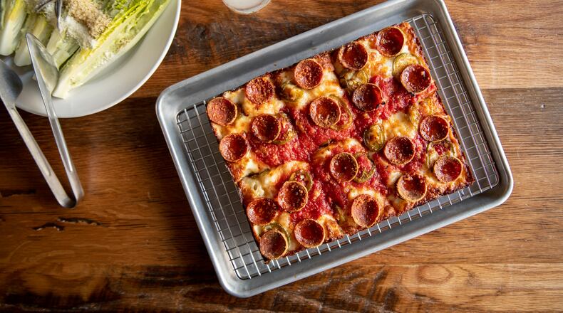 Emmy Squared Colony pizza with Ezzo pepperoni, pickled jalapenos, and honey. (Mia Yakel for The Atlanta Journal-Constitution)