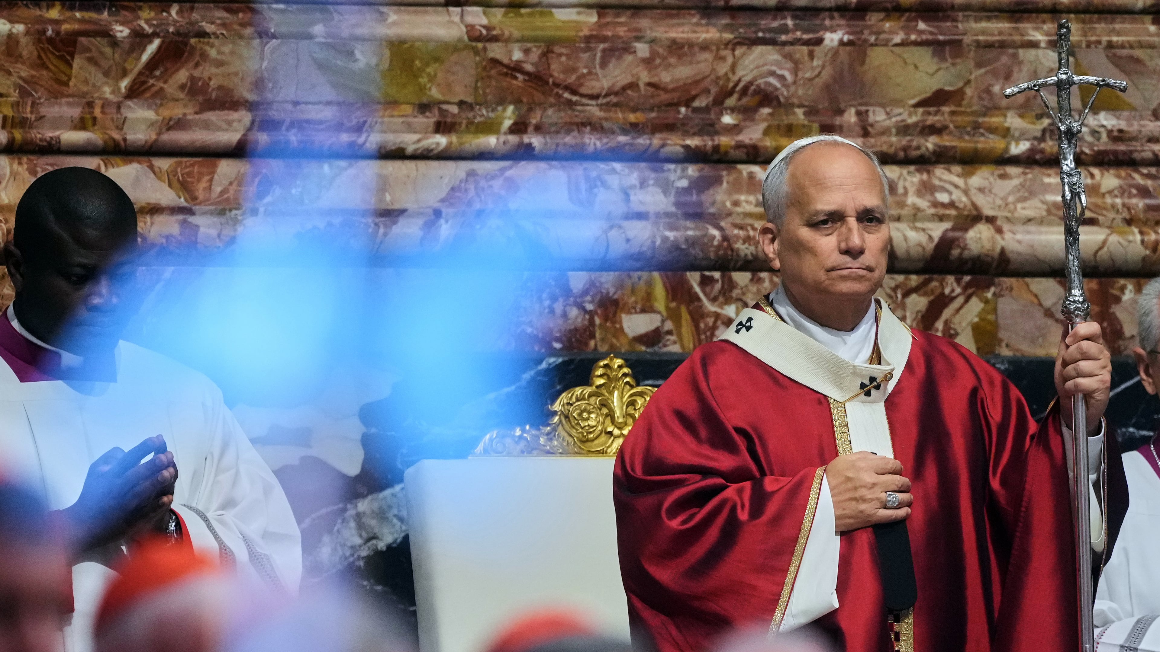 FILE - Pope Leo XIV arrives in St. Peter's Basilica at the Vatican for Mass for the repose of the soul of the late Pope Francis and deceased cardinals, Monday, Nov. 3, 2025. (AP Photo/Andrew Medichini), File)