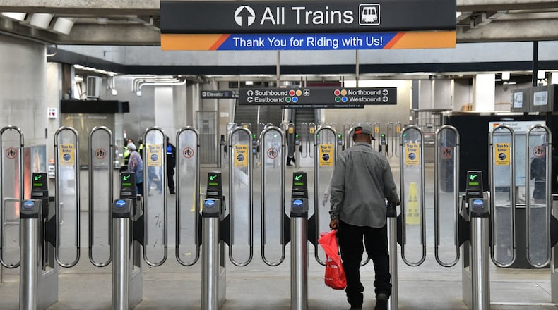 A Marta customer enters the Five Points MARTA station on Thursday, March 25, 2021. (Hyosub Shin / Hyosub.Shin@ajc.com)