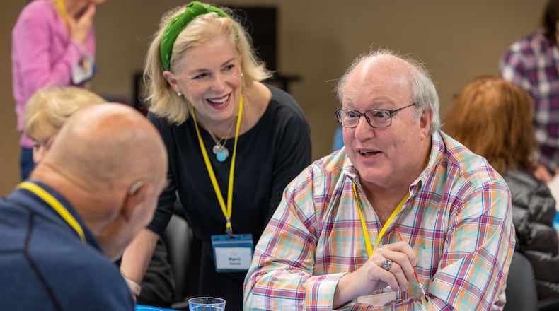 Volunteer Marci Nunnery helps member Doug Jones with art project during a Respite Care Atlanta meeting at Second-Ponce de Leon Baptist Church in Atlanta.
PHIL SKINNER FOR THE ATLANTA JOURNAL-CONSTITUTION