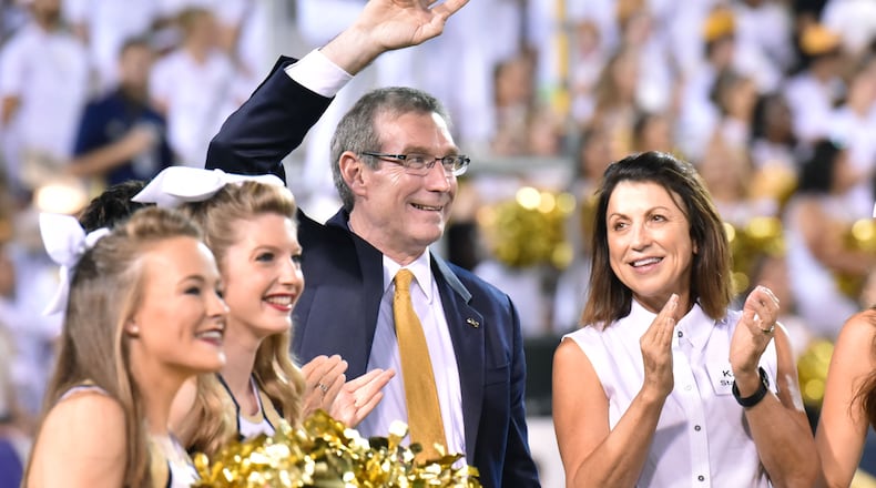 Georgia Tech new AD Todd Stansbury waves to fans during Georgia Tech Yellow Jackets game against the Clemson Tigers at Bobby Dodd Stadium on Thursday, September 22, 2016. HYOSUB SHIN / HSHIN@AJC.COM