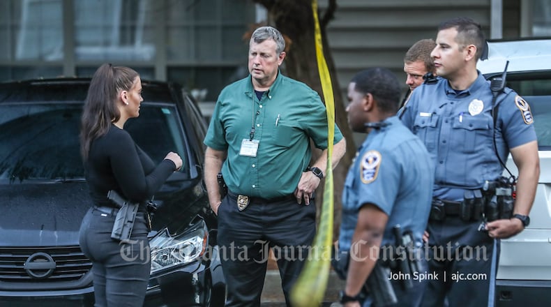 Gwinnett police are investigating all possible motives after a double shooting left a man dead and a teen injured Thursday at the Durant Sugarloaf Apartments near Lawrenceville.