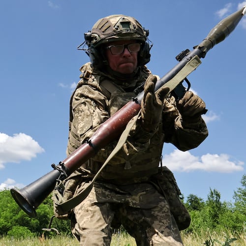 In this photo provided by Ukraine's 65th Mechanized Brigade press service, a soldier practices military skills at a training ground near the frontline in the Zaporizhzhia region, Ukraine, Saturday, June 20, 2026. (Andriy Andriyenko/Ukraine's 65th Mechanized Brigade via AP)