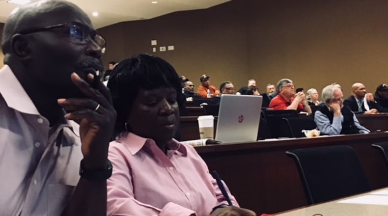 Eddie and Janice Bogan, both Marine veterans who served at Camp Lejeune, listen with other veterans at the Lejeune Community Assistance Panel meeting on Tuesday at Emory University. The Griffin couple were among more than 200 veterans and family members registered for the meeting to hear about contaminated water exposure at the North Carolina base from the 1950s to the 1980s. BRAD SCHRADE / BSCHRADE@AJC