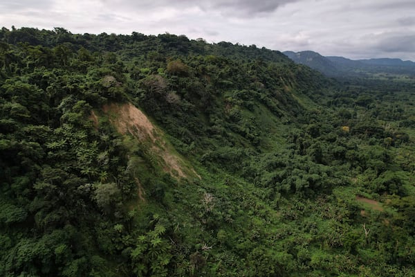 Landslides triggered by cyclones, heavy rainfall and earthquakes scar the landscape in Efate Island, Vanuatu, Thursday, July 17, 2025. (AP Photo/Annika Hammerschlag)