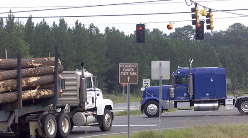 A divided Georgia House of Representatives approved a bill Monday that would allow heavier trucks on state highways. (AJC FILE PHOTO)