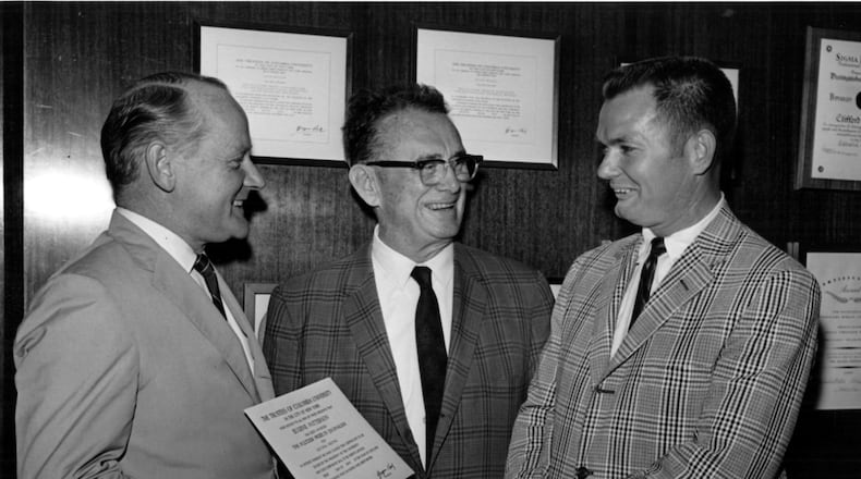Three Pulitzer winners: Jack Nelson, right, was photographed with (from left), Eugene Patterson and Ralph McGill. Patterson, who was editor of The Atlanta Constitution in the 1960s, is holding his Pulitzer Prize citation, awarded in 1967. McGill, the crusading columnist and publisher, won it in 1959. Nelson won his Pulitzer while reporting for the Constitution a year later, in 1960.