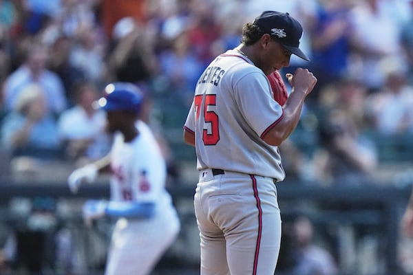 Braves pitcher Didier Fuentes tries not to watch Mets outfielder Ronny Mauricio's home run trot.