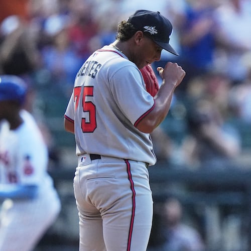 Atlanta Braves pitcher Didier Fuentes, right, reacts as New York Mets' Ronny Mauricio runs the bases after hitting a home run during the third inning of a baseball game Wednesday, June 25, 2025, in New York. (Frank Franklin II/AP)