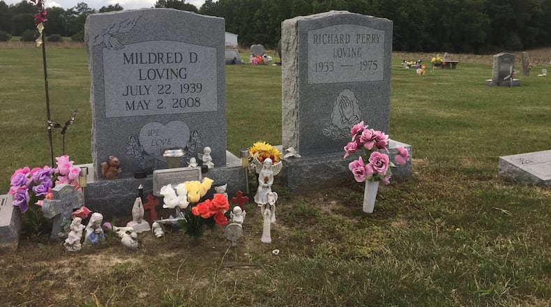 The graves of Richard and Mildred Loving are seen in a rural cemetery near their former home in Caroline County, Virginia, Wednesday, June 7, 2017. Richard Loving, a white man, and his wife Mildred, a black woman, challenged Virginias ban on interracial marriage and ultimately won their case at the U.S. Supreme Court in 1967. Monday, June 12, 2017 marks 50 years since the Supreme Court issued that opinion, which overturned laws against interracial marriage in 16 states.  (AP Photo/Jessica Gresko)