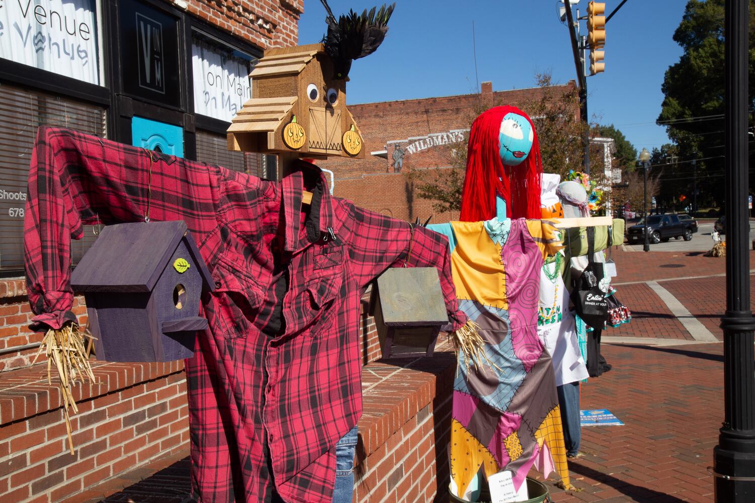 Scarecrows line Main Street in Kennesaw