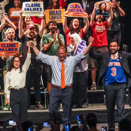 Democratic Congressional candidates, Claire Valdez, Brad Lander, and Darializa Avila gesture on stage with New York City Mayor Zohran Mamdani during a Get Out The Vote rally ahead of New York's primary election, Thursday, June 18, 2026, in the Brooklyn borough of New York. (AP Photo/Ryan Murphy)