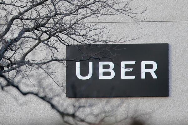 Uber is cutting 3,700 full-time workers, and its CEO will give up his base salary with the nation largely still in lockdown.