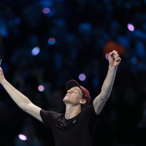 Italy's Jannik Sinner reacts after winning the final tennis match of the ATP World Tour Finals against Spain's Carlos Alcaraz in Turin, Italy, Sunday, Nov. 16, 2025. (AP Photo/Antonio Calanni)