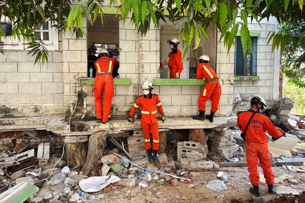 Burmese rescuers work through the rubble of a collapsed building following Friday's earthquake in Naypyitaw, Myanmar, Thursday, April 3, 2025. (AP Photo)