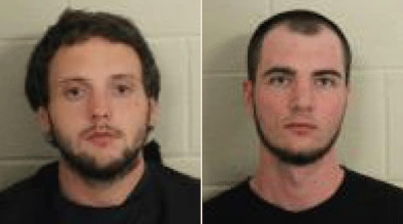 Two men were arrested Monday for allegedly colluding on Facebook to murder a woman, authorities said.