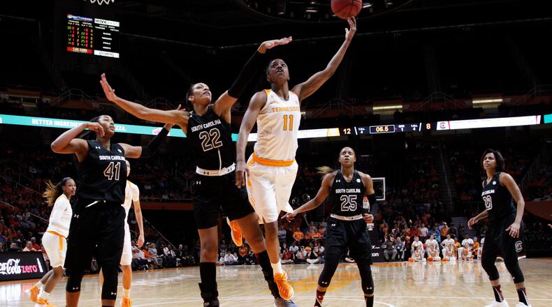 Tennessee guard Diamond DeShields (11) puts up a shot as she's defended by South Carolina forward A'ja Wilson (22) in the first half of an NCAA college basketball game Monday, Feb. 15, 2016, in Knoxville, Tenn. (AP Photo/Wade Payne)