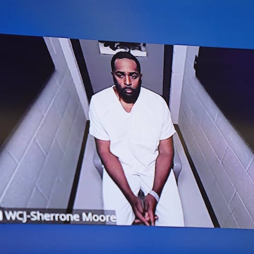 Fired Michigan football coach Sherrone Moore appears via video in court on Friday, Dec. 12, 2025 in Ann Arbor, Mich. (AP Photo/ Ryan Sun, Pool)