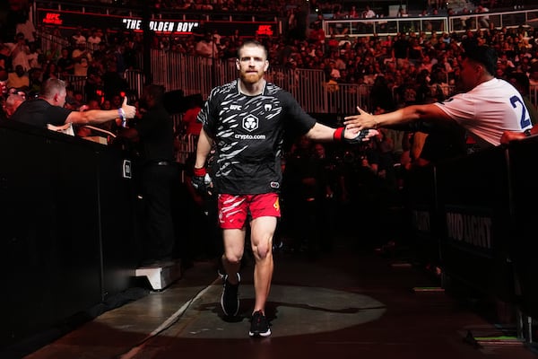 Edmen Shahbazyan runs out prior to facing Andre Petroski in a middleweight bout during the UFC Fight Night event at State Farm Arena on Saturday, June 14, 2025. It was UFC’s fifth visit to Atlanta since first entering in 2009. The sold-out event generated $3.2 million at the gate. (Courtesy of Cooper Neill/Zuffa LLC)
