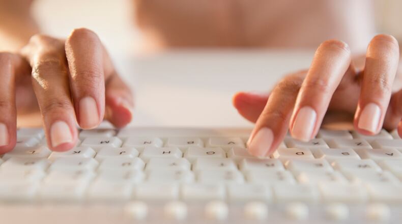 Woman typing on keyboard. (Blend Images - JGI/Jamie Grill / Brand X Pictures / Getty Images)