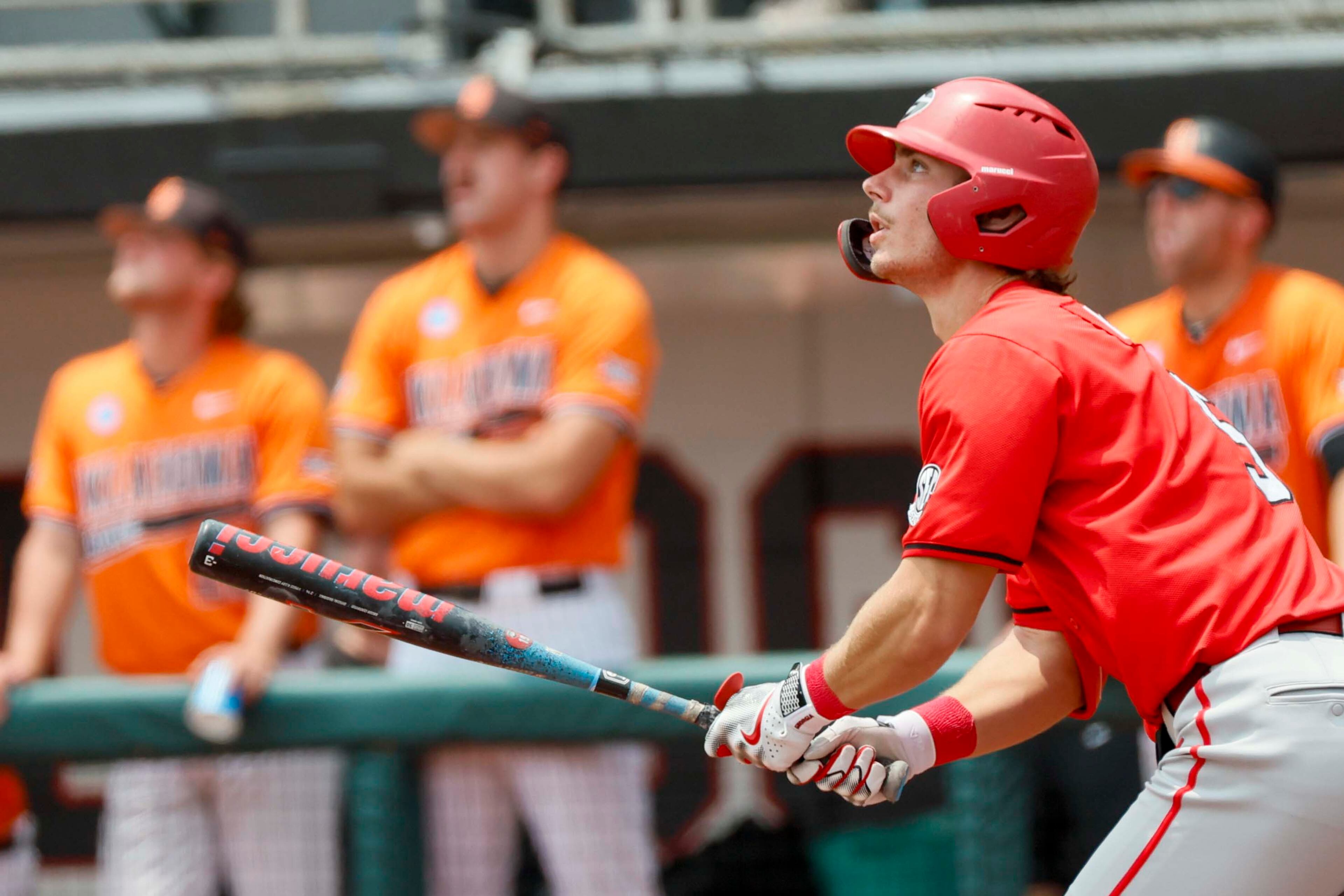 Georgia infielder Christian Adams (5) watches his two-run home run during the second inning against Oklahoma State in their NCAA Regional game at Foley Field,  Sunday, June 1, 2025, in Athens, Ga.Georgia infielder Christian Adams (5)
(Miguel Martinez/ AJC)