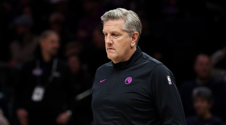Minnesota Timberwolves head coach Chris Finch looks on during the first half of an NBA basketball game against the Golden State Warriors, Sunday, Jan. 25, 2026, in Minneapolis. (AP Photo/Matt Krohn)