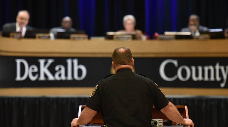 DeKalb Police Chief James Conroy stands before commissioners during DeKalb County Commission meeting on Tuesday, Dec. 5, 2017. The DeKalb Board of Commissioners voted 7-0 Tuesday to delay a decision until next week on whether to cut off alcohol service at 2 a.m. in unincorporated areas. Commissioners asked county police to compile crime statistics surrounding late-night bars before reducing their hours. HYOSUB SHIN / HSHIN@AJC.COM