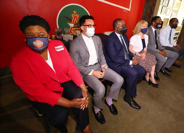 Atlanta mayoral candidates (from left) Council President Felicia Moore, Councilman Antonio Brown, former Atlanta Mayor Kasim Reed, attorney Sharon Gay, Councilman Andre Dickens, and local businessman Richard Wright take part in a mayoral forum on August 4. (Curtis Compton / Curtis.Compton@ajc.com)