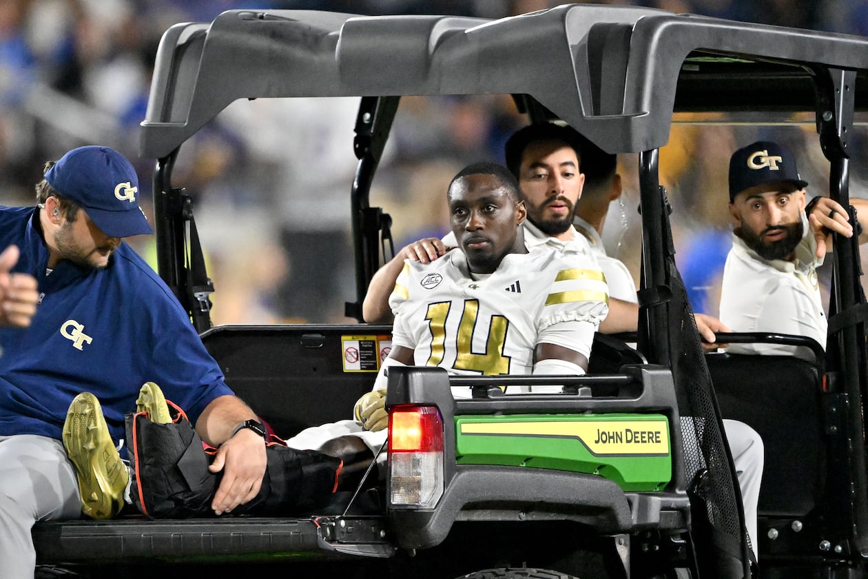 Georgia Tech defensive back Jy Gilmore (14) leaves after he got injured during the first half in an NCAA college football game at Bobby Dodd Stadium, Saturday, November 22, 2025, in Atlanta. Pittsburgh won 42-28 over Georgia Tech. (Hyosub Shin/AJC)