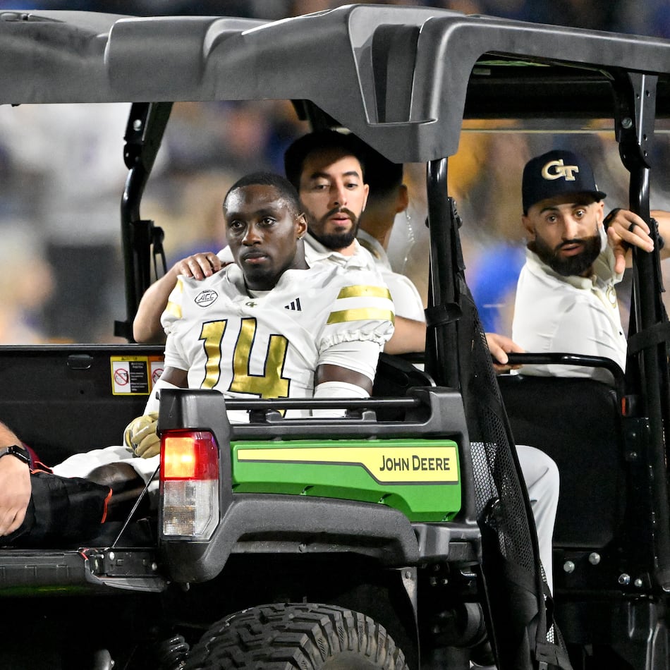 Georgia Tech defensive back Jy Gilmore (14) leaves after he got injured during the first half in an NCAA college football game at Bobby Dodd Stadium, Saturday, November 22, 2025, in Atlanta. Pittsburgh won 42-28 over Georgia Tech. (Hyosub Shin/AJC)