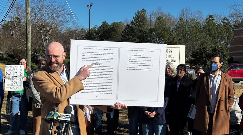 State Sen. Josh McLaurin, a Georgia Democrat, spoke about a lawsuit at a news conference on Monday, Feb. 17, 2025. (Greg Bluestein/AJC)