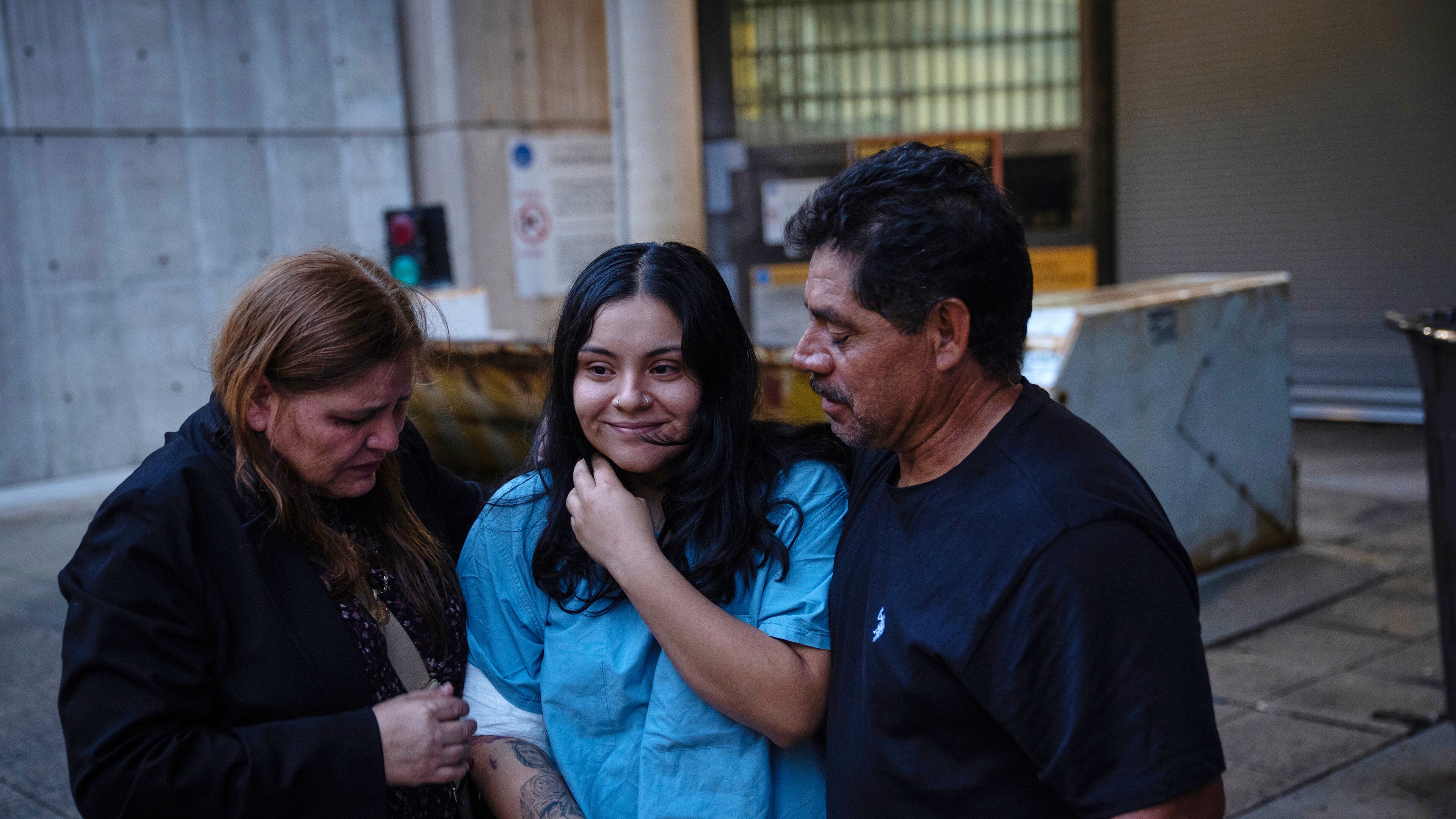 Marimar Martinez, center, is greeted by her family after being released from the Metropolitan Correctional Center on Oct. 6, 2025, after being shot by immigration agents and charged with assaulting federal officers in an incident in Chicago's Brighton Park. (E. Jason Wambsgans/Chicago Tribune via AP)