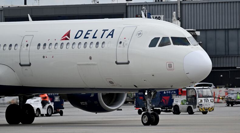 Delta is allowing travelers to rebook flights that could be interrupted by 250th U.S. anniversary celebrations. (Hyosub Shin/AJC)