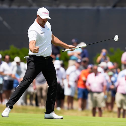 Wyndham Clark celebrates after a birdie on the 13th hole during the second round of the U.S. Open golf tournament at Shinnecock Hills Golf Club in Southampton, N.Y., Friday, June 19, 2026.(AP Photo/Seth Wenig)