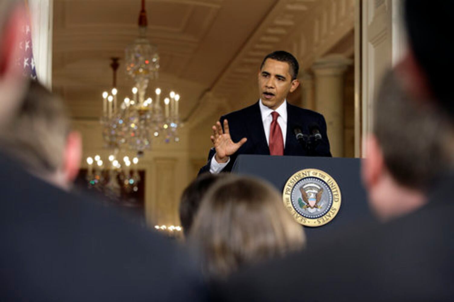 Obama defends plans for economic recovery