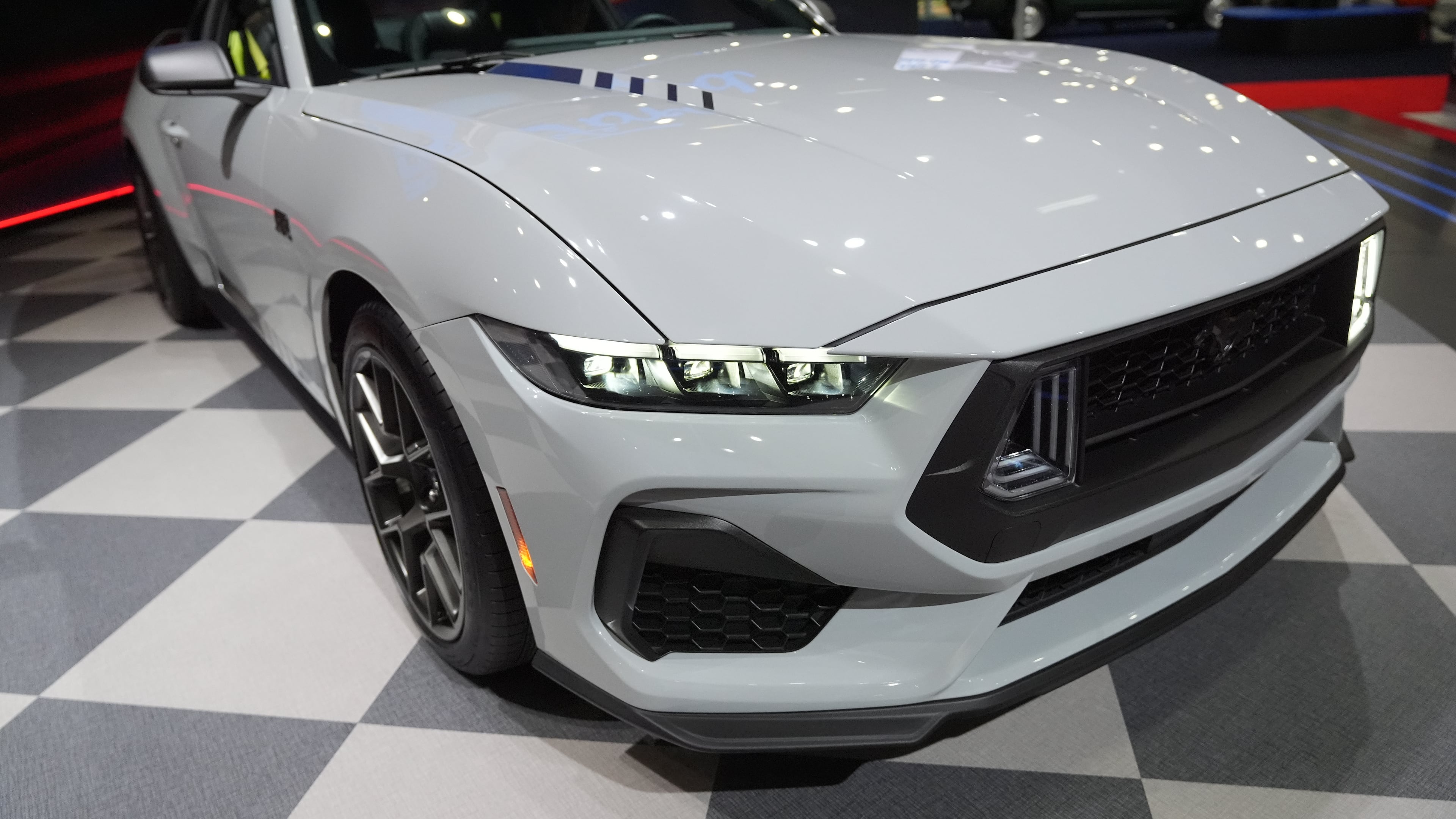 The 2026 Ford Mustang GT is revealed at the LA Auto Show in Los Angeles Thursday, Nov. 20, 2025. (AP Photo/Damian Dovarganes)