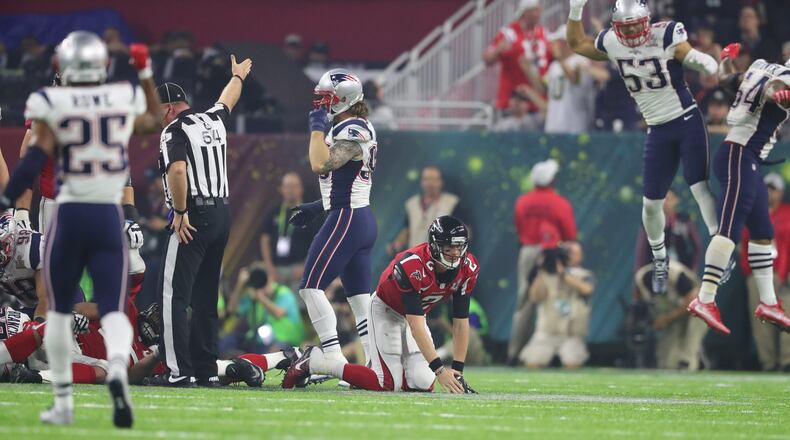The New England Patriots celebrate a recovery of Matt Ryan’s fumble in the fourth quarter of Super Bowl LI at NRG Stadium in Houston, TX, Sunday, February 5, 2017. The Patriots beat the Falcons in OT 34-28. (Curtis Compton/AJC)