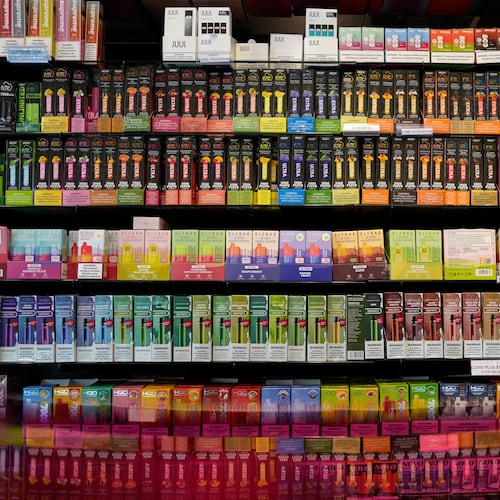 FILE - Disposable flavored electronic cigarette devices are displayed for sale at a store in Pinecrest, Fla., June 26, 2023. (AP Photo/Rebecca Blackwell, File)