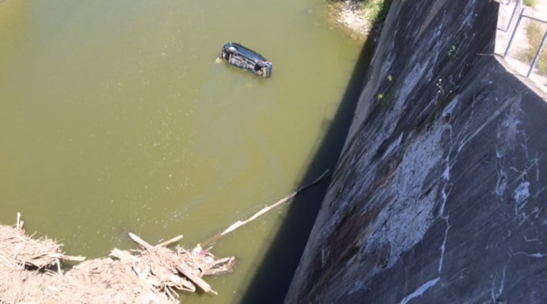 Officials aren’t sure what caused the driver to lose control and go over the edge of the U.S. 40 dam bridge. (Randy Ragsdale/Staff)