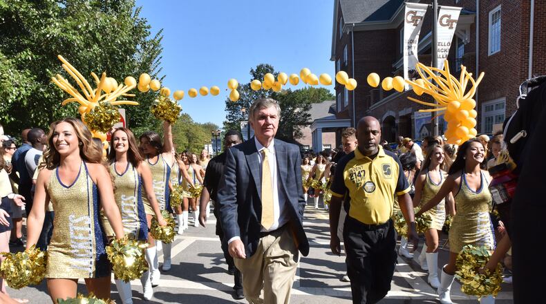 Game 2 -- Georgia Tech 37, Jacksonville 10: Jackets coach Paul Johnson walks to Bobby Dodd Stadium before the home opener against Jacksonville State on Sept. 9. Hyosub Shin/hshin@ajc.com